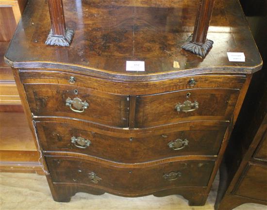 Serpentine fronted walnut chest of drawers